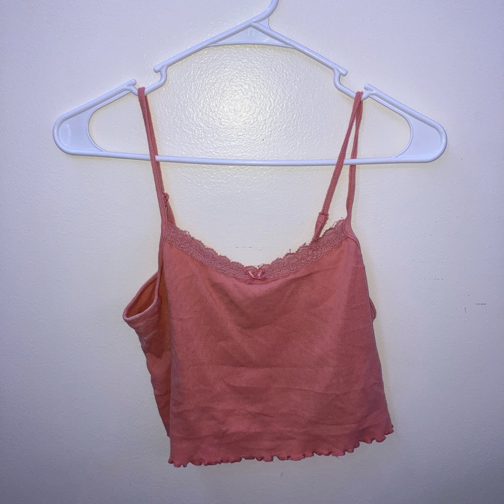 pink top with a cute little bow so cute with some jeans